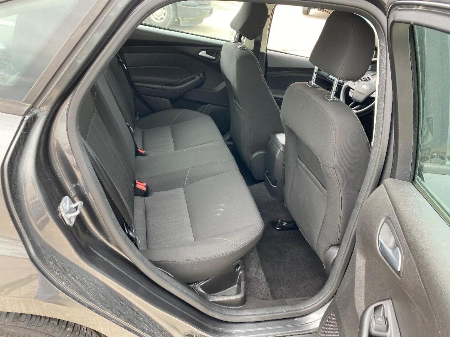2017 Grey /Black Ford Focus (1FADP3F2XHL) , located at 1687 Business 35 S, New Braunfels, TX, 78130, (830) 625-7159, 29.655487, -98.051491 - Photo#9